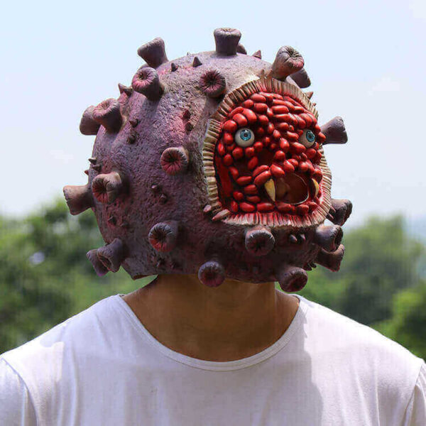 coronavirus latex face mask halloween prop, corona virus halloween mask, the model with the latex mask is looking at left